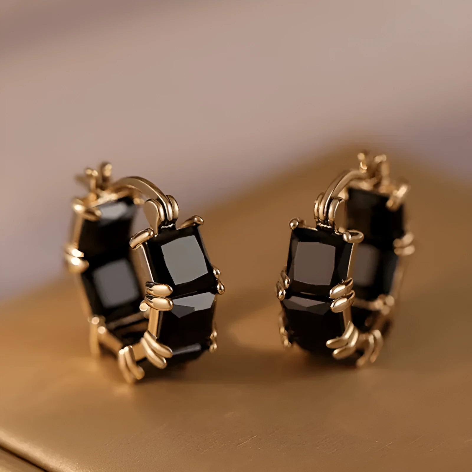 Geometric U-shaped women's earrings with zircon stones and gold plating