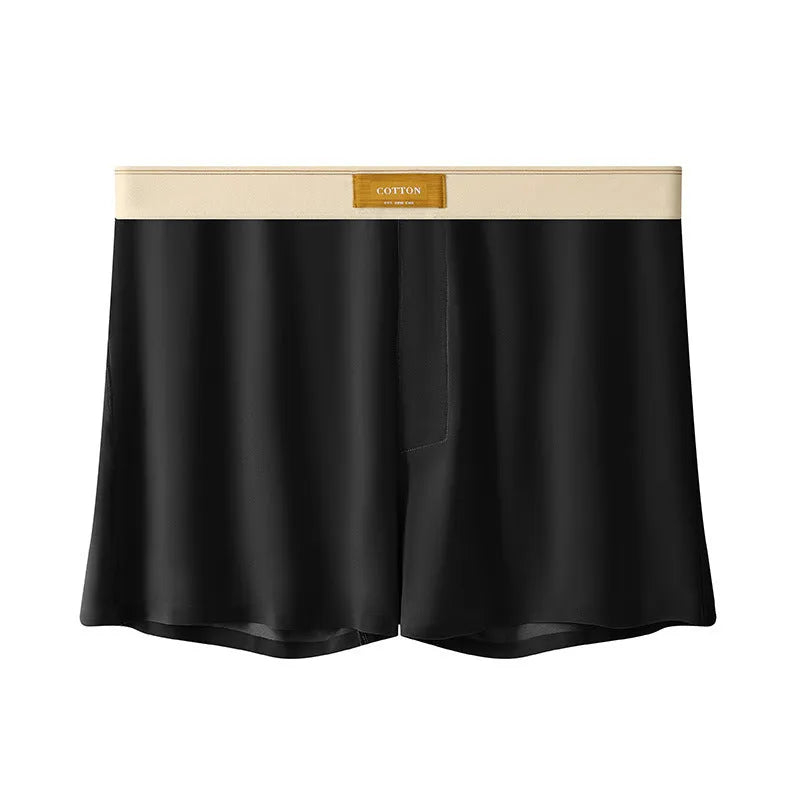 Pack of three men's solid colour loose fit ice silk nylon underwear on a mid waist mannequin.