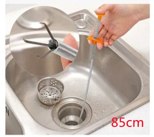 Flexible drain cleaning spring tool with gripped handle for removing hair from pipes