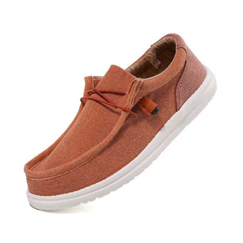 Men's green and orange canvas casual shoes with colourful mosaic design and round toe