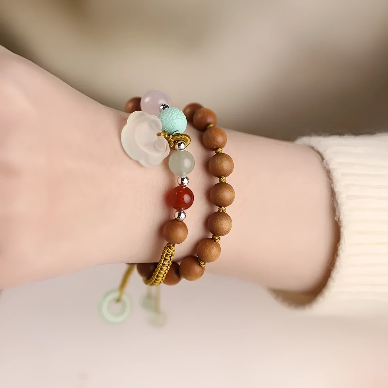 Hand-woven ebony double ring bracelet with traditional jade beads and Ruyi charm elements