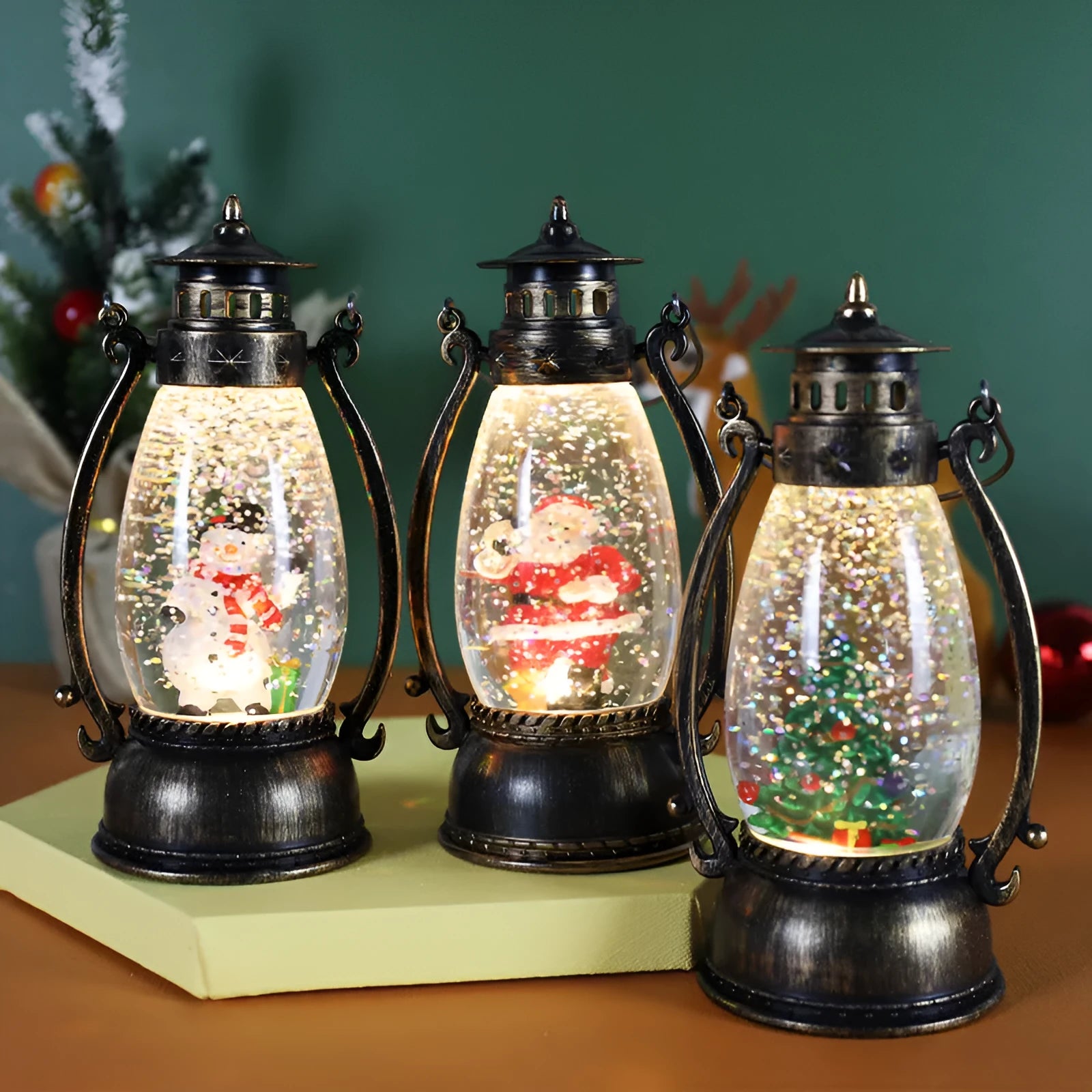 Clear plastic crystal ball LED portable oil lamp with a decorative snowman figure inside on a table.