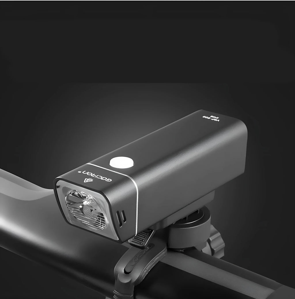 CREE XPG3 600 lumen aluminium bicycle headlight with black finish mounted on handlebars, IPX6 waterproof for night riding