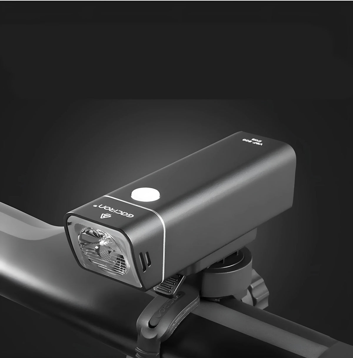 CREE XPG3 600 lumen aluminium bicycle headlight with black finish mounted on handlebars, IPX6 waterproof for night riding