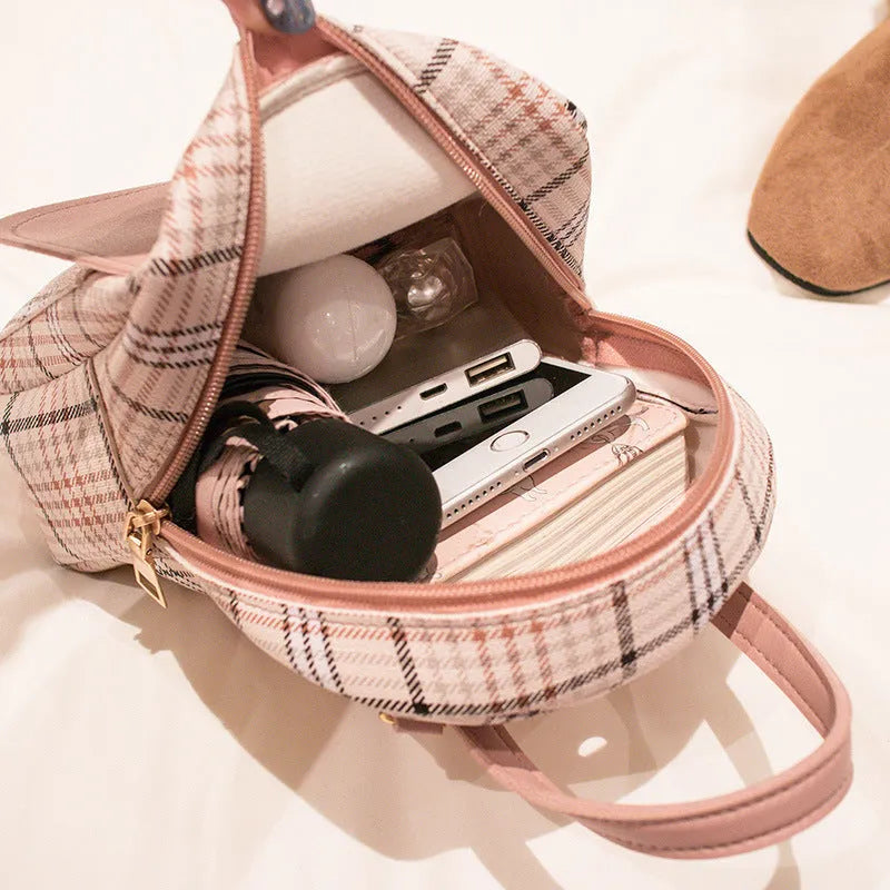 One shoulder diagonal phone bag in PU fabric shown in available colours: black, blue, brown, pink, red.