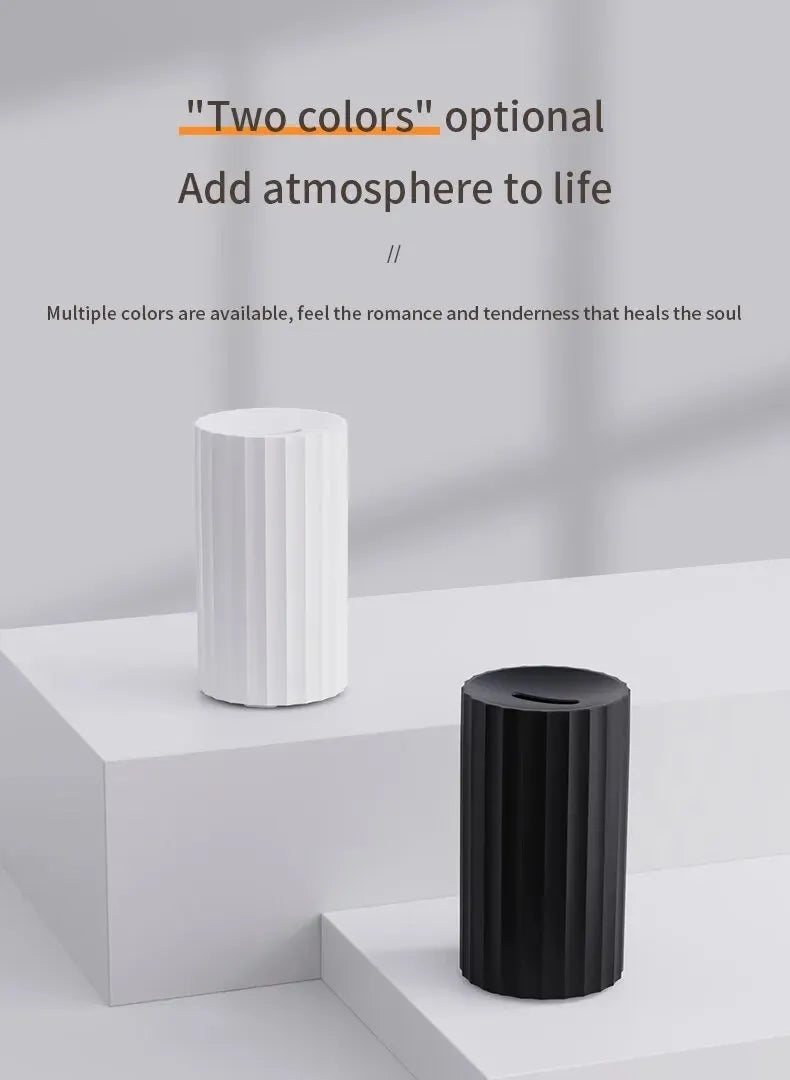 Essential oil diffuser humidifier with flame effect LED lighting in black or white colour option