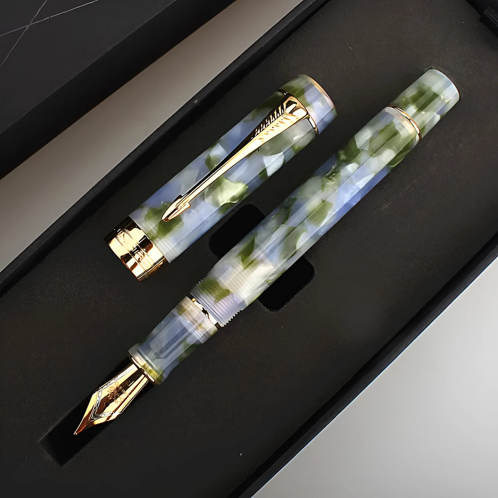 Deep bath green metal ballpoint pen with three interchangeable nib options shown