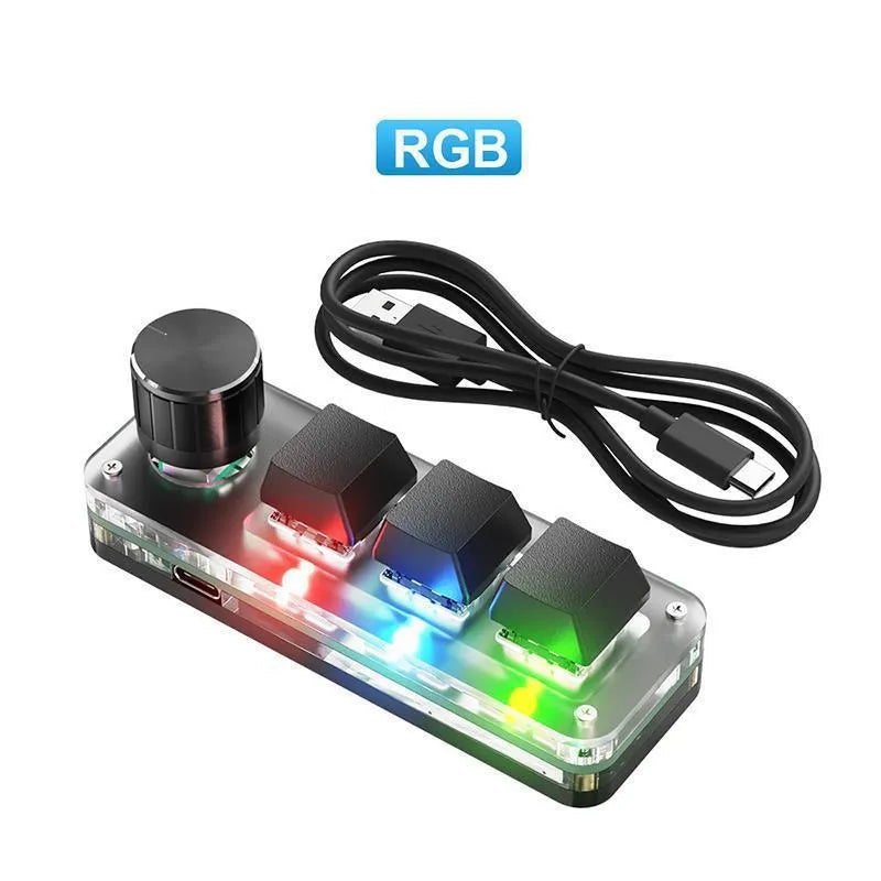 Black mechanical mini keyboard with RGB backlit copy and paste keys measuring 15cm wide