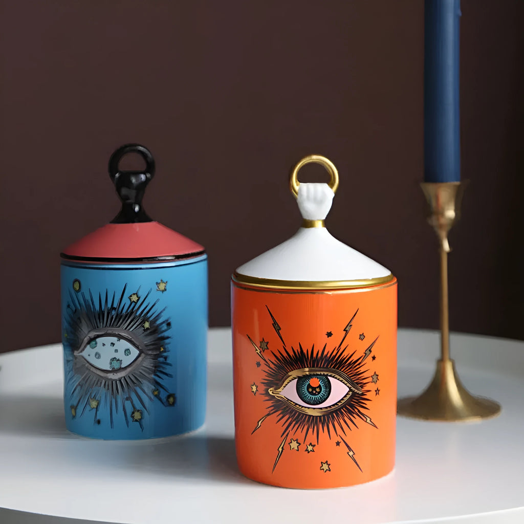 Ceramic Big Eyes candle holder with decal pattern in blue standing on a surface