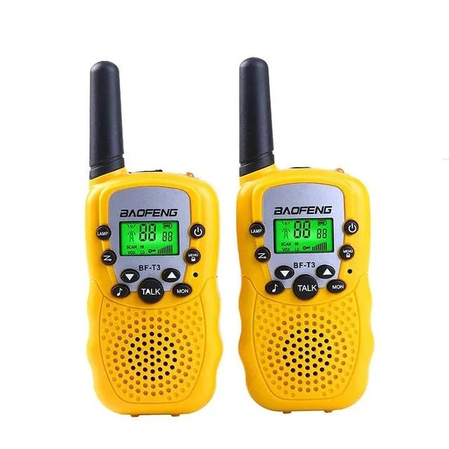 Child holding colourful walkie talkie with 22-channel display and push-to-talk button