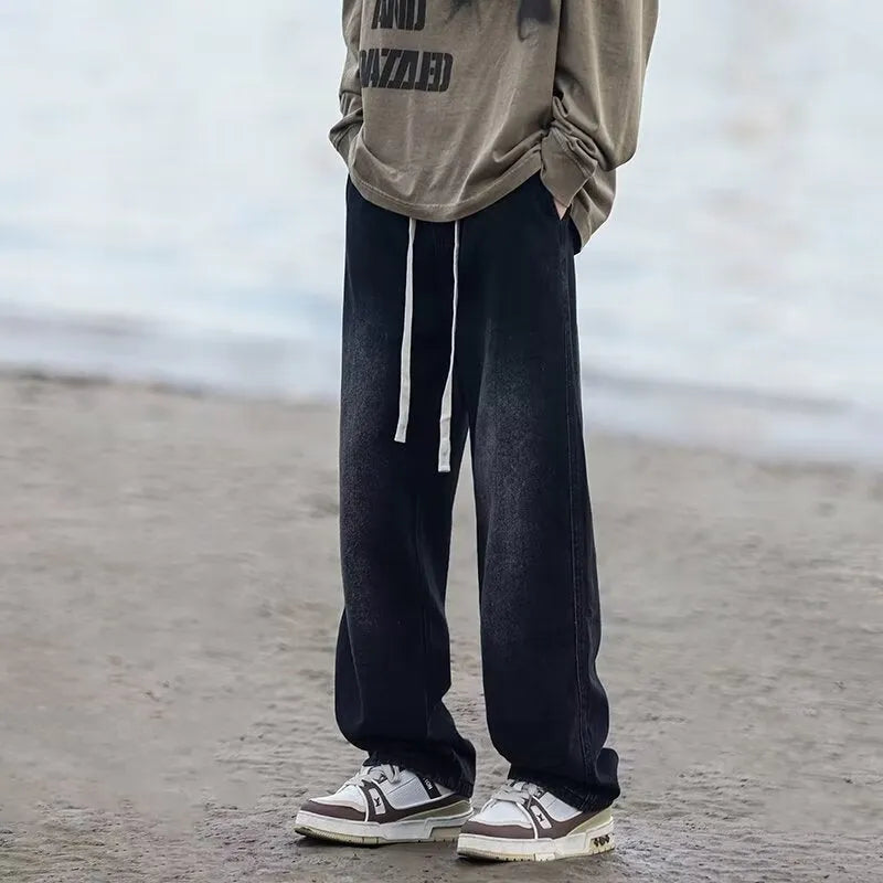 Men's straight-leg blue jeans with drawstring waist on mid-waist cut