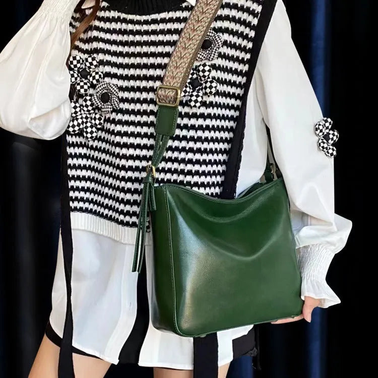 Women's leather shoulder messenger bag in square vertical shape with multiple compartments