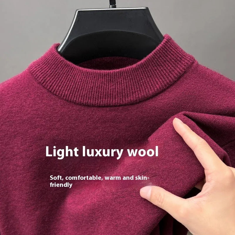 Men's fine yarn half turtleneck sweater in a solid colour on a hanger