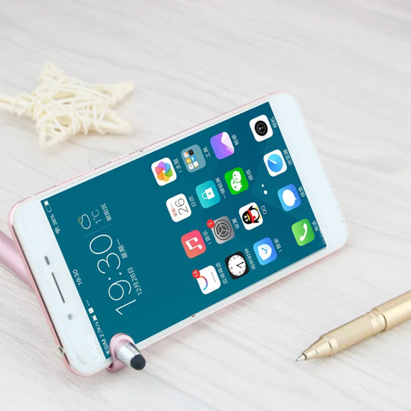Multifunctional pen with touchscreen stylus tip and integrated mobile phone holder feature