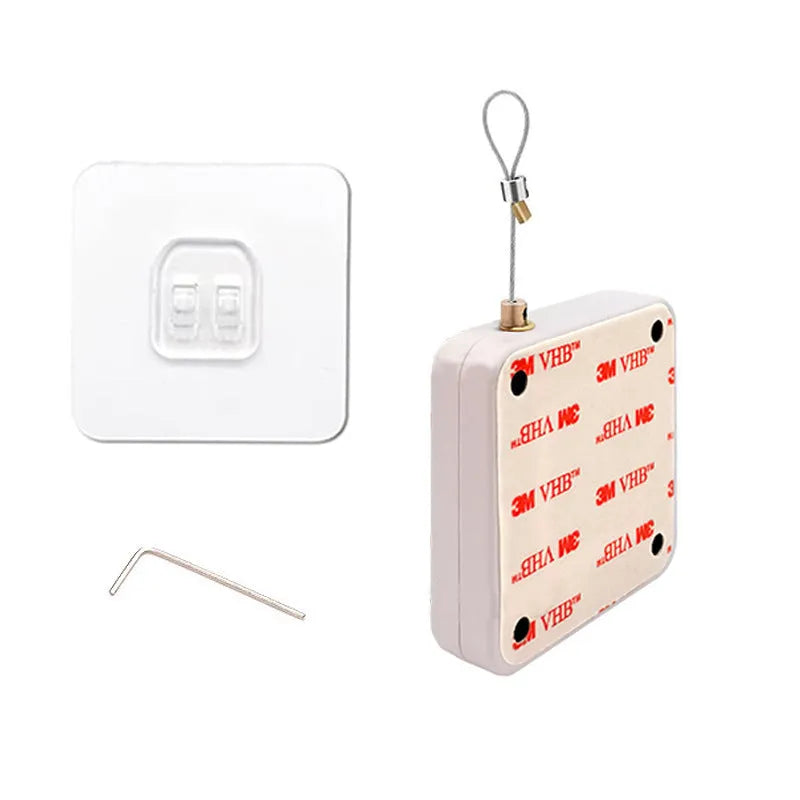 White automatic door closer with adhesive mount and tension adjuster for no-drill installation on doors.