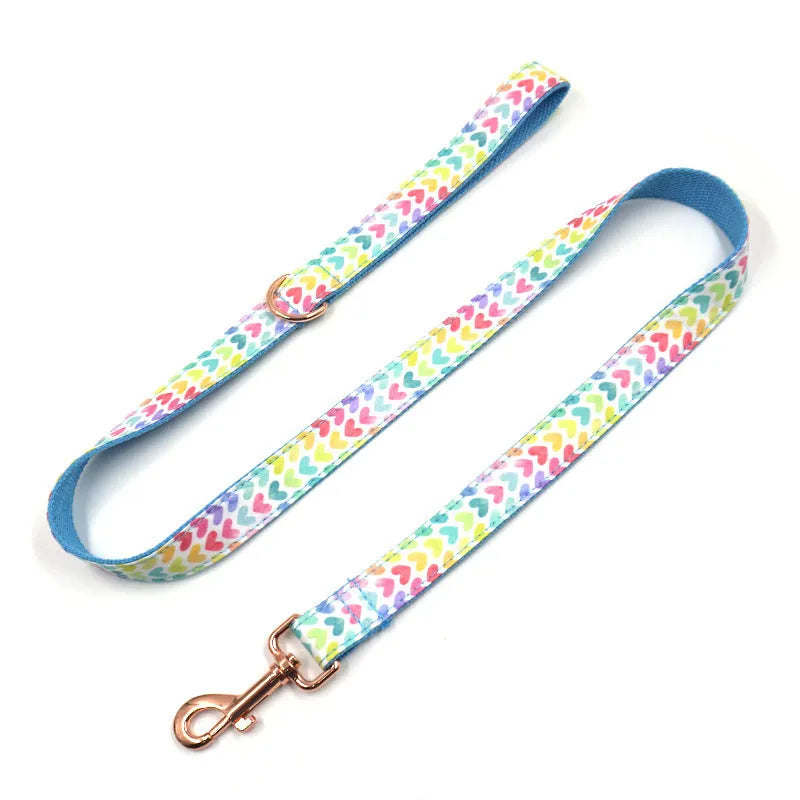 Rose gold cloth adjustable dog collar and lead rope set on a dog