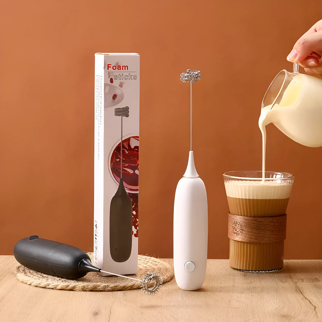 Black and white handheld electric milk frother and blender with modern design