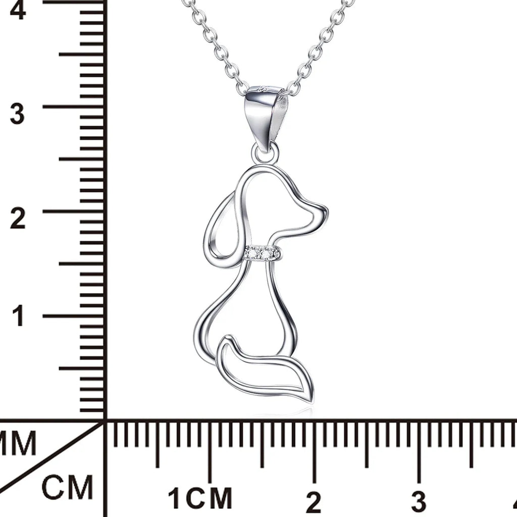 Ladies 925 sterling silver dog pendant necklace with adjustable round bead chain on neutral background