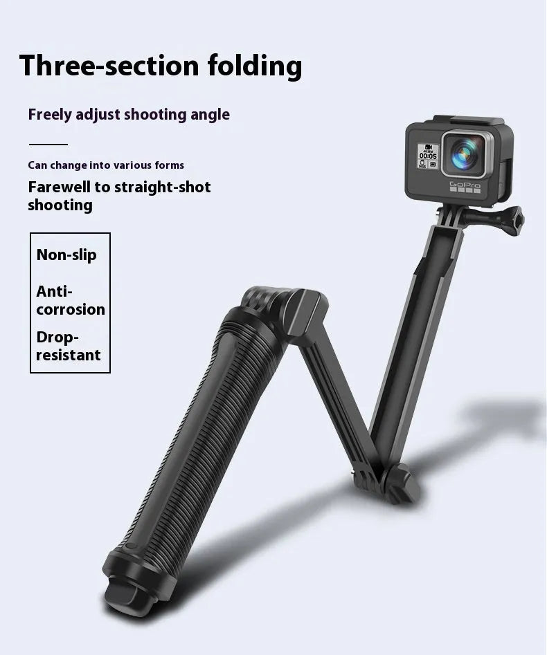 Black folding tripod stand for GoPro Hero action cameras on a flat surface