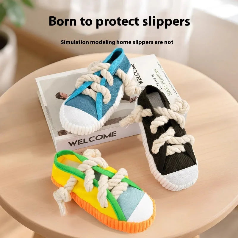 Slipper-shaped plastic dog chew toy with a squeaker, shown in yellow, black, and blue colour options.