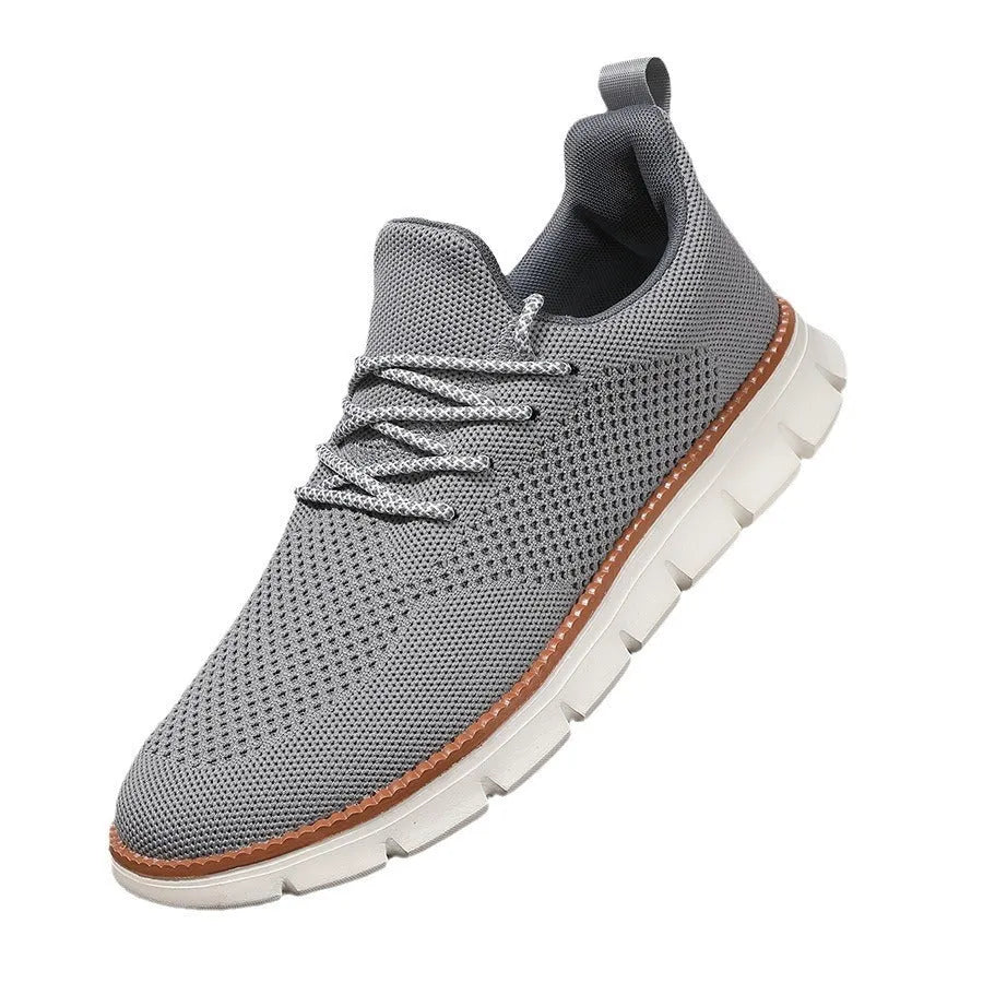 Men's grey and black mesh fabric casual sneakers with low heel and round toe.