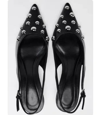 Women's black pointed stiletto wedge heel shoes with rivet decorations and synthetic PU upper