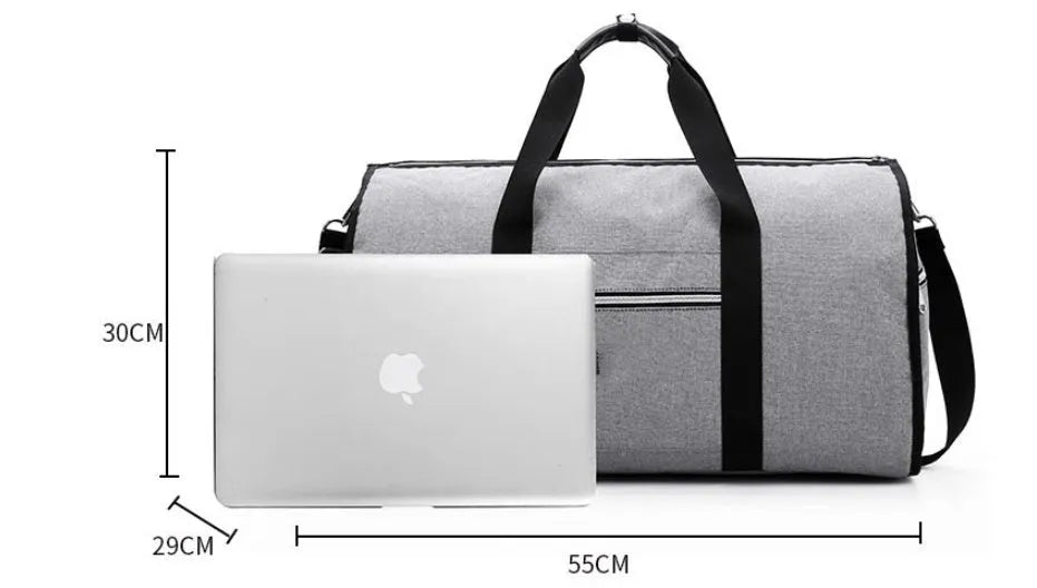 Medium-sized cylindrical travel bag in black Oxford cloth with a zipper and carrying handles.