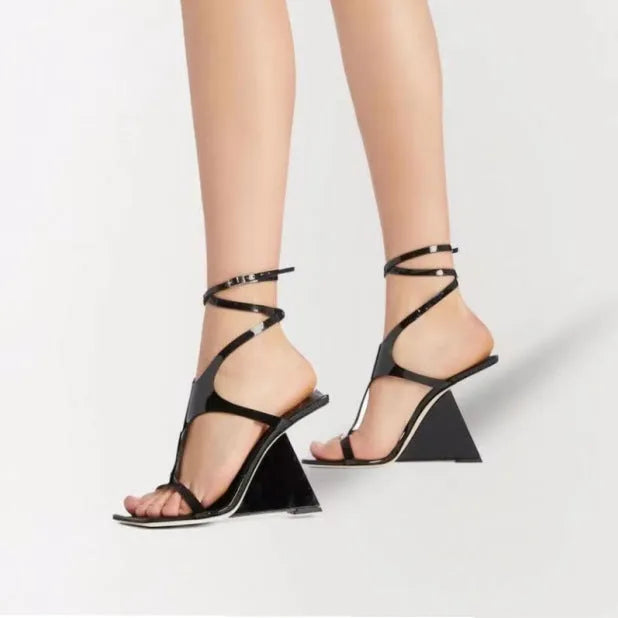 Women's black square toe high heel sandals with a button strap on a 9.5cm heel.