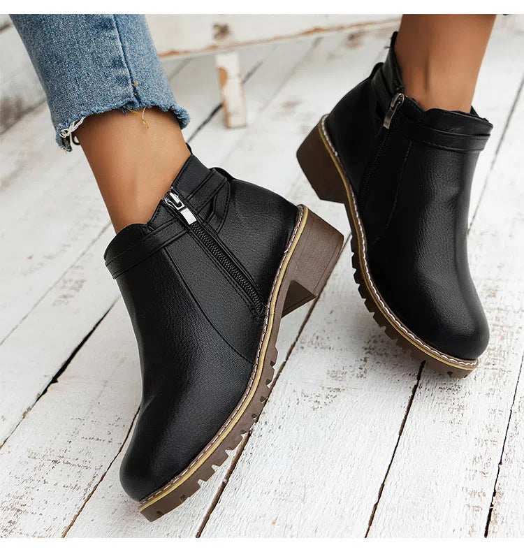 Women's low-heeled ankle boots with belt buckle, round toe, chunky heel, side zipper, in black synthetic PU leather