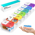 Extra large white and rainbow colour plastic pill dispenser with 14 removable compartments.