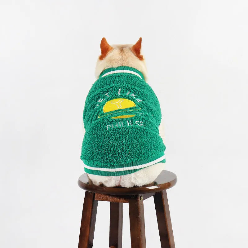 Green fleece-lined cotton winter coat for a dog on a size chart showing L, XL, XXL, 3XL, and 4XL.