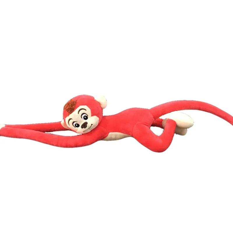 Long arm plush monkey toy hanging over a curtain pole in dark brown colour.