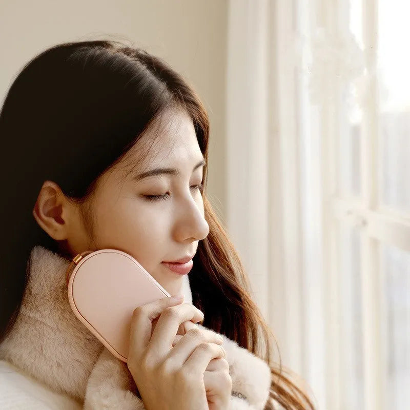 Rechargeable electric hand warmer in green with double-sided heating and 5000mAh power bank function