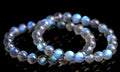 Natural cream body blue moonlight crystal bracelet showing minimalist design on wrist.