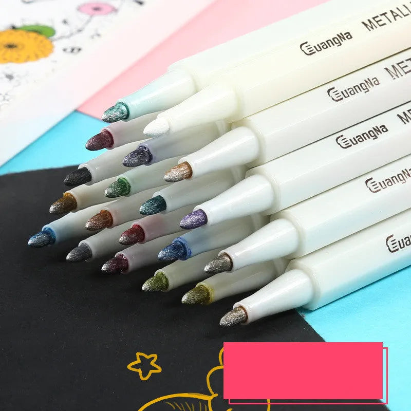 Card album metal pen set with plastic storage case containing multiple black barrel pens in various colours