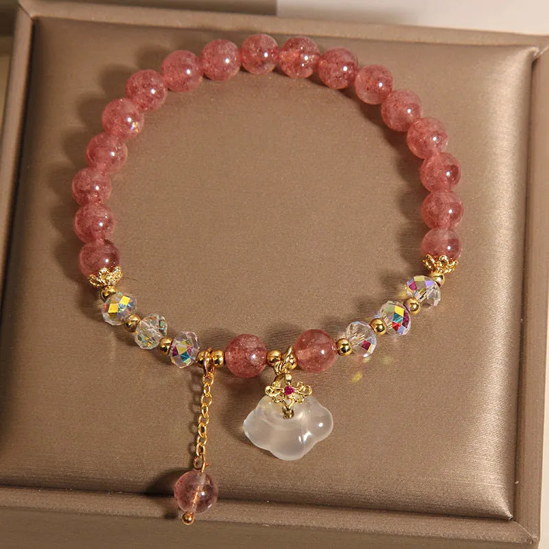 Women's natural crystal bracelet with strawberry quartz beads, white agate beads, and traditional auspicious cloud charm