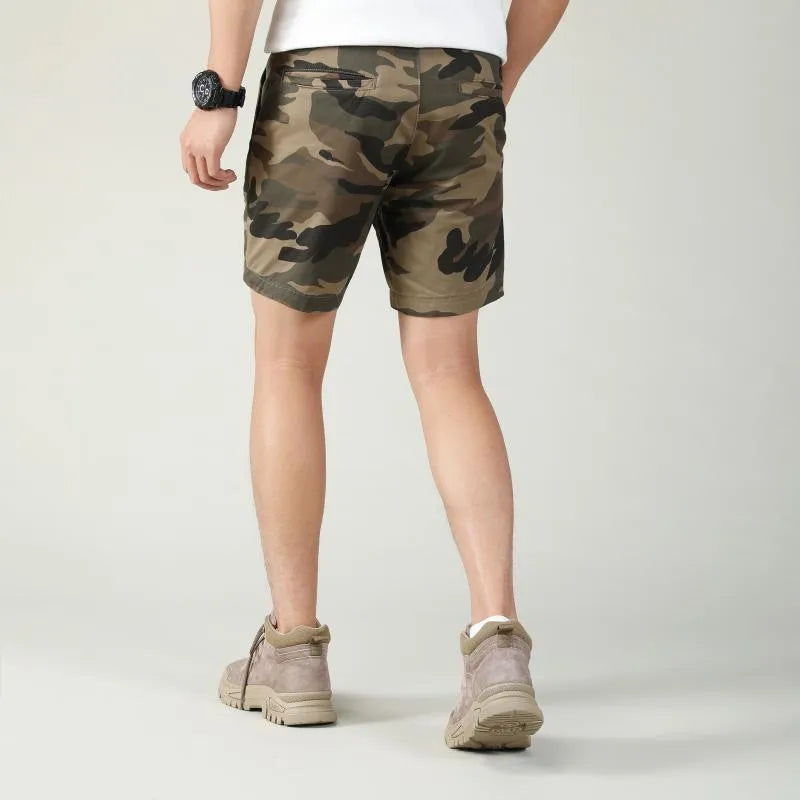 Men's green camouflage cotton workwear shorts with mid-waist design and zip fly placket