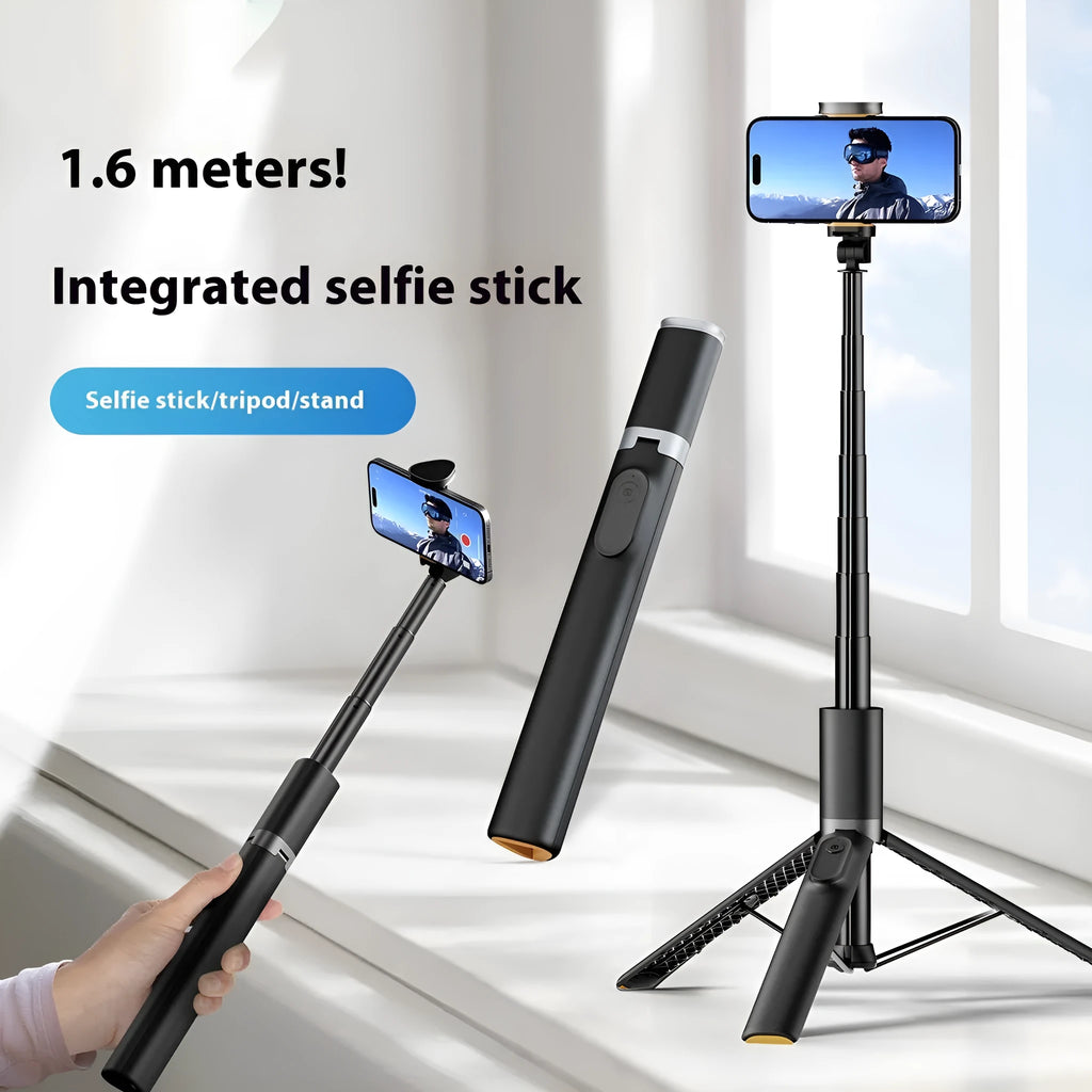 Mobile Bluetooth live streaming integrated stand selfie stick in black alloy on a tabletop with smartphone attached for hands-free recording.