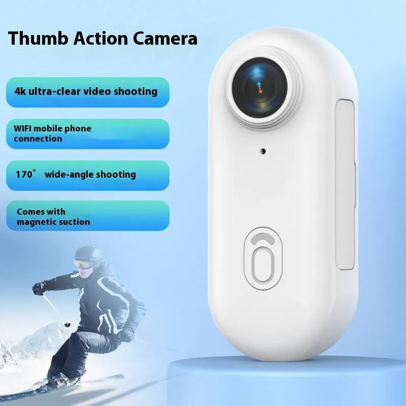 Mini black 4K action camera with magnetic mount attached to a bicycle helmet.