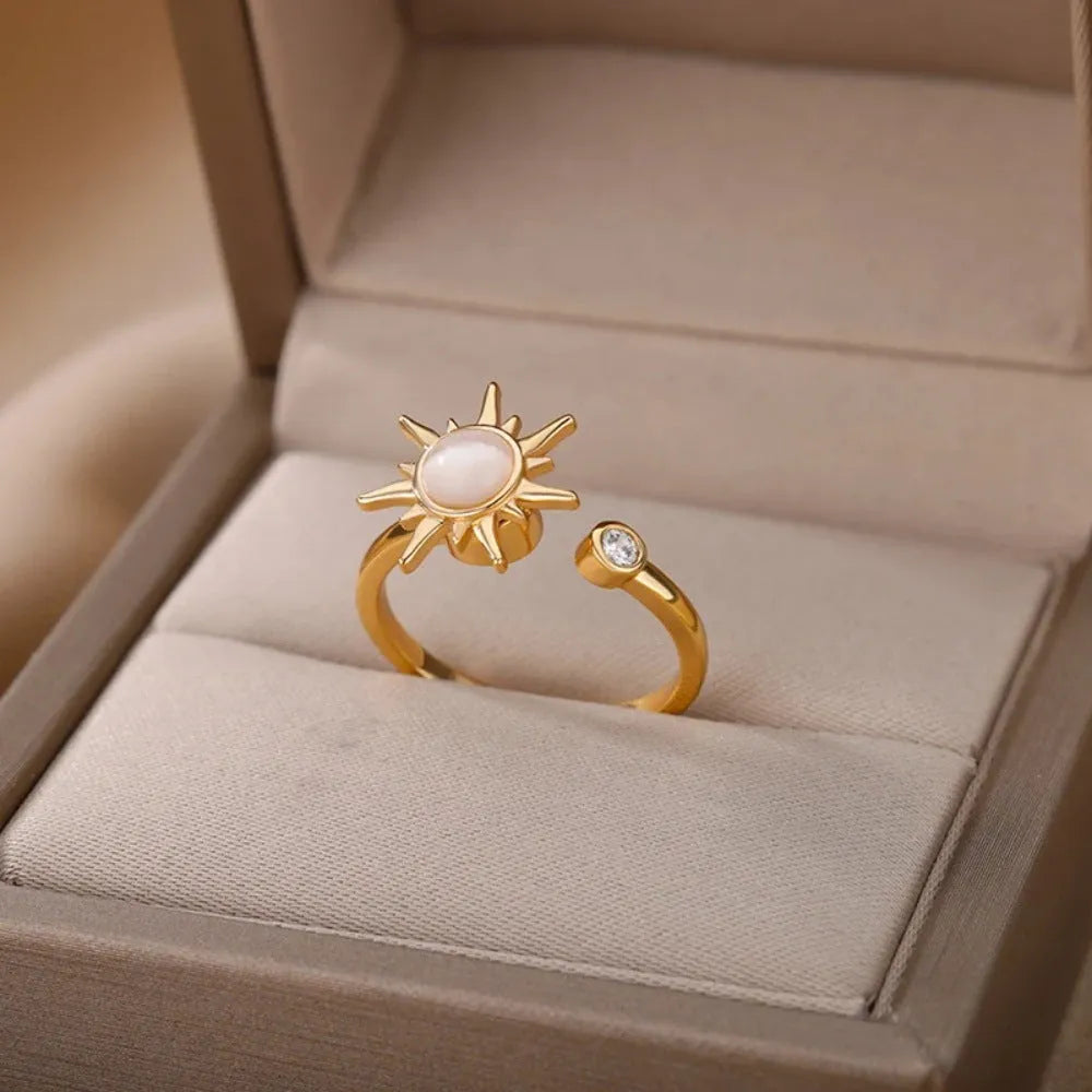 Geometric rotatable ring with adjustable opening in gold electroplated finish on copper base