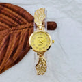 Stainless steel women's watch with round dial showing gold face colour option and vachette clasp buckle