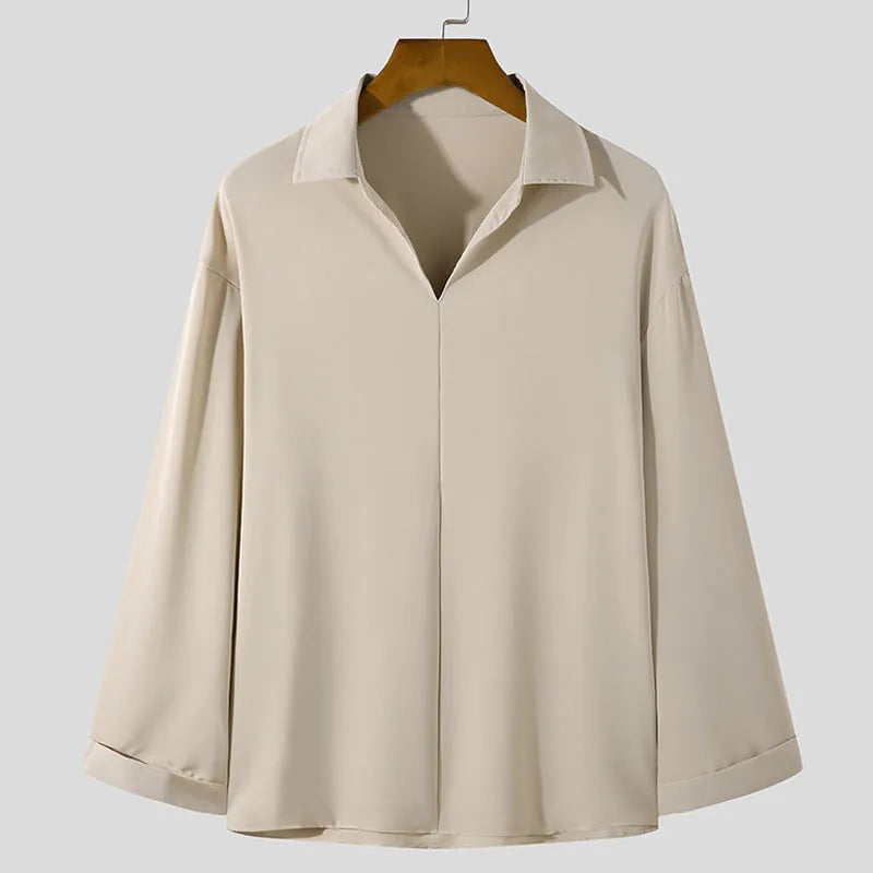 Men's loose lapel casual shirt in a solid colour, shown in a light business style with long sleeves.