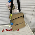 Street style messenger bag backpack in polyester Oxford fabric with sewing line detailing