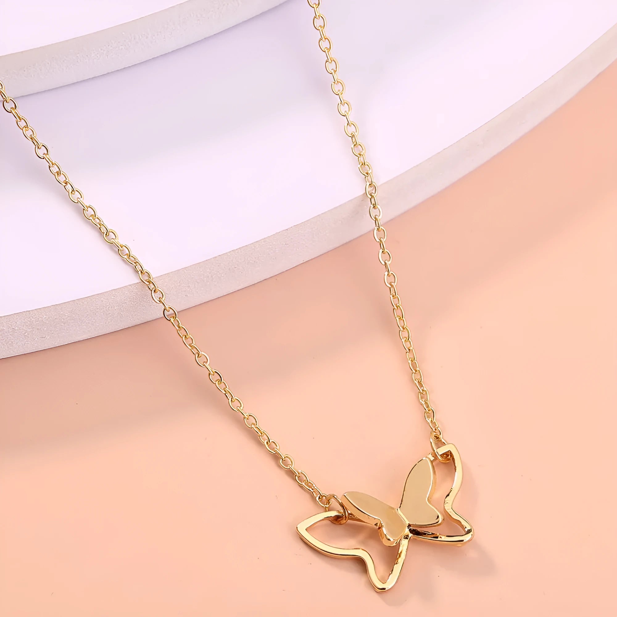 Women's double-layer copper alloy bow pendant necklace on adjustable cross chain
