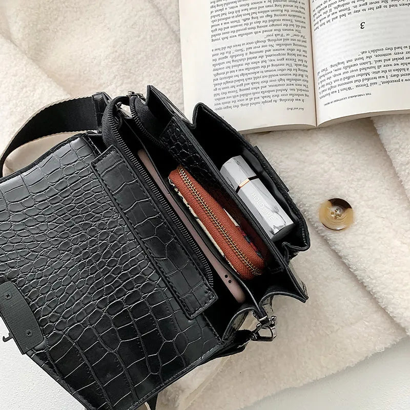 Vintage-style PU leather crossbody bag in black, shown with dimensions for scale.