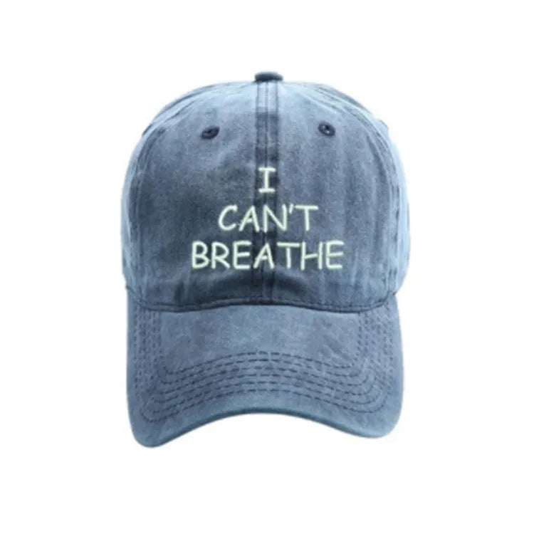 Embroidered 'I can't breathe' cotton baseball cap on display