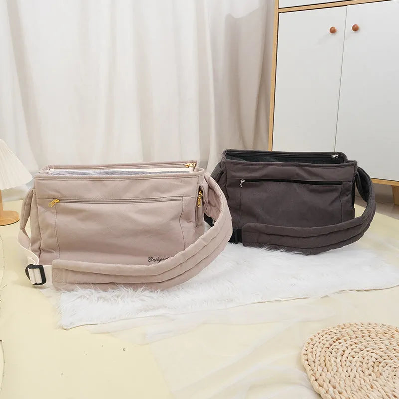 Soft surface large capacity pet messenger bag in black and beige with shoulder strap