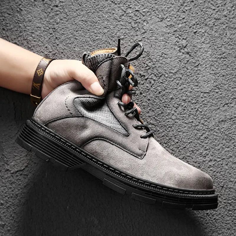 Men's frosted leather vintage Martin boots with thick rubber sole in black, shown on foot.