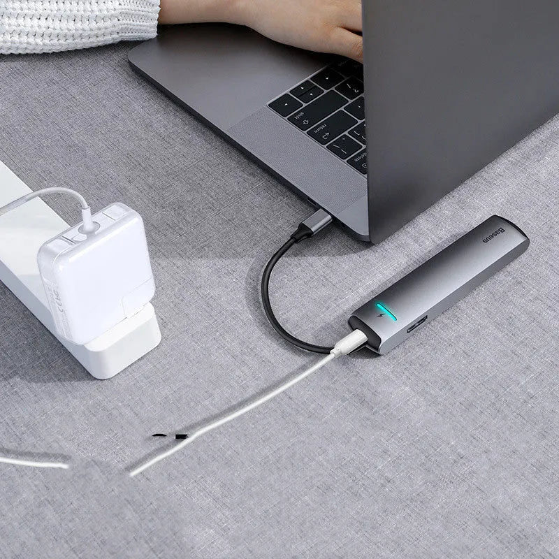 Dark grey Type-C docking station hub compatible with Apple MacBook and iPhone models with 5Gbps transfer rate