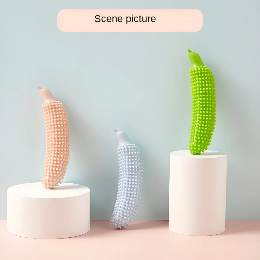 Soft green cucumber-shaped dog chew toy for teething and bite-resistant play.